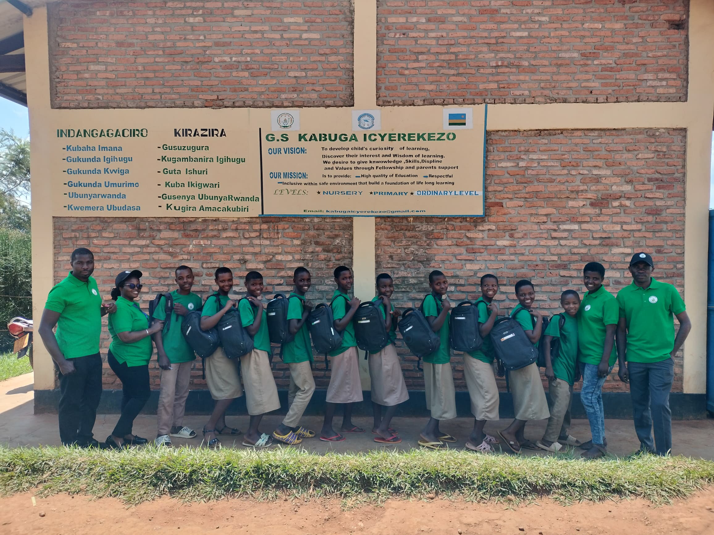 A vibrant classroom of students learning tailoring techniques.